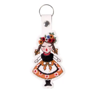 "Pendentif brodé Krakowiak Zachodni : un bijou artisanal avec des motifs traditionnels polonais, parfait pour exprimer votre attachement à la culture polonaise.